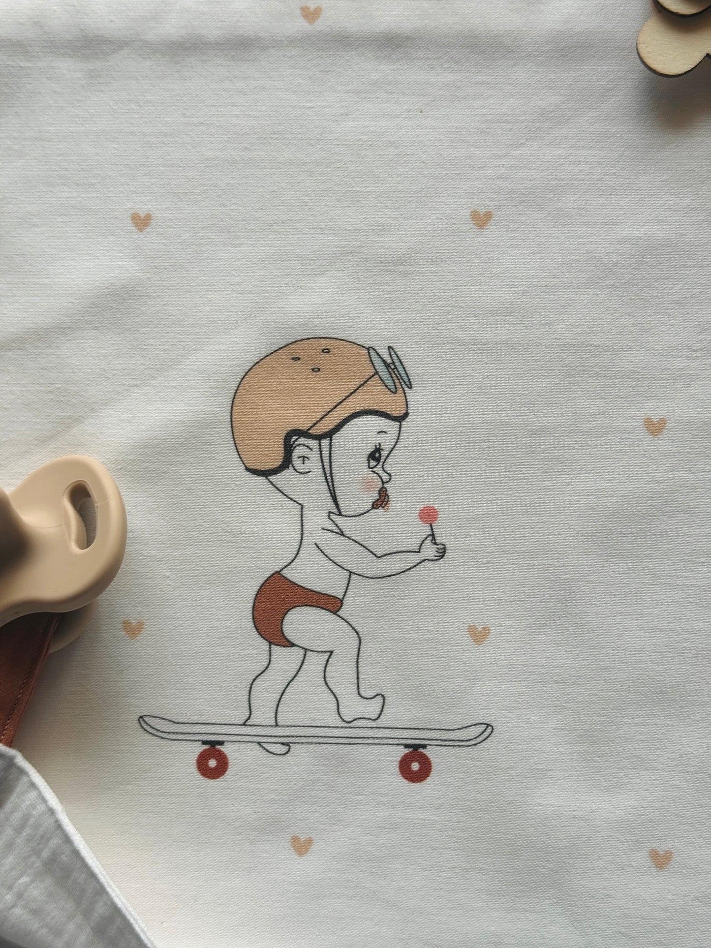 Carré accroche tétine - Bébé skater